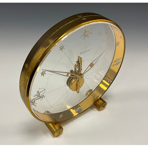 1982 - A Jaeger Le Coultre Tischuhr 'Sternzeichen, perspex and gilt metal deck clock, eight-day visible mov... 