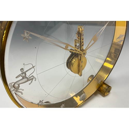 1982 - A Jaeger Le Coultre Tischuhr 'Sternzeichen, perspex and gilt metal deck clock, eight-day visible mov... 