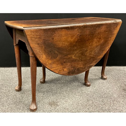 1540 - A George II mahogany gateleg table, oval top, tapering cylindrical legs with pad feet, c.1750, 72.5c... 