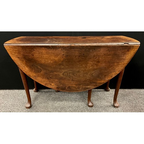 1540 - A George II mahogany gateleg table, oval top, tapering cylindrical legs with pad feet, c.1750, 72.5c... 