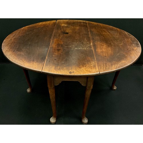 1540 - A George II mahogany gateleg table, oval top, tapering cylindrical legs with pad feet, c.1750, 72.5c... 