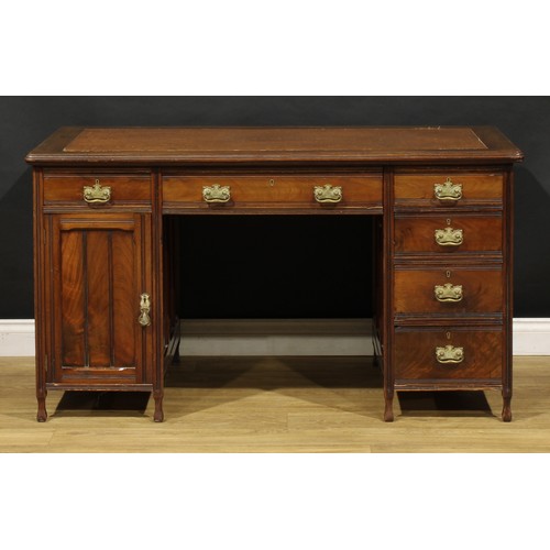 1555 - An Edwardian mahogany twin pedestal desk, rounded rectangular top with moulded edge and inset writin... 