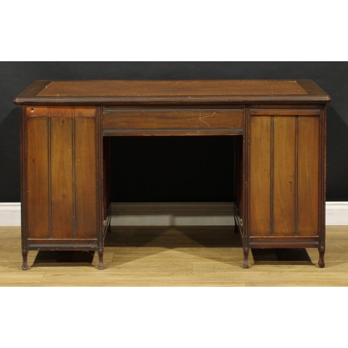 1555 - An Edwardian mahogany twin pedestal desk, rounded rectangular top with moulded edge and inset writin... 