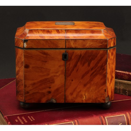 1654 - A George III tortoiseshell tea caddy, canted rectangular form, silver wire detailing, twin lidded co... 