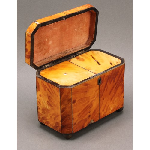 1654 - A George III tortoiseshell tea caddy, canted rectangular form, silver wire detailing, twin lidded co... 