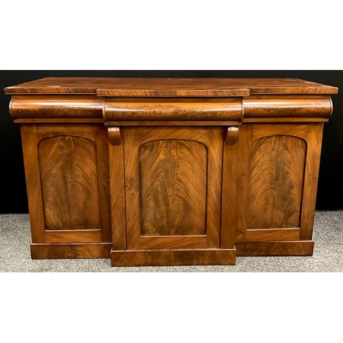 1576 - An early Victorian mahogany chiffonier sideboard, break-centre front, with three frieze drawers, abo... 