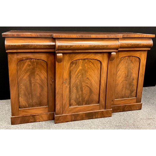 1576 - An early Victorian mahogany chiffonier sideboard, break-centre front, with three frieze drawers, abo... 