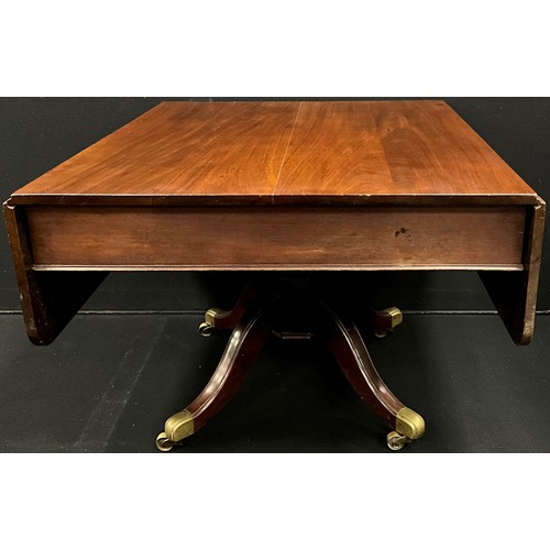 2135 - A Regency mahogany drop-leaf breakfast table, 74cm high, 106cm wide, 93cm (150cm with leaves extende... 