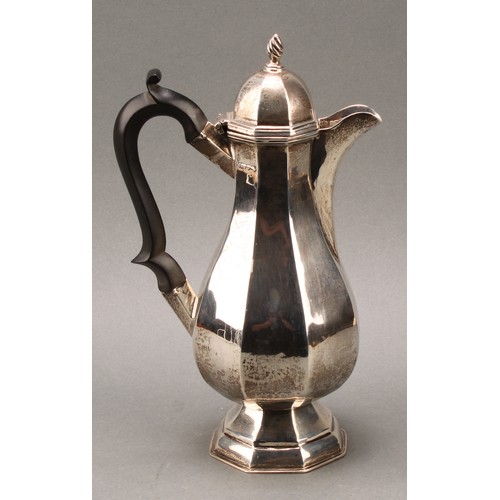 236 - An Edwardian silver octagonal baluster coffee pot, hinged cover with wrythen finial, ebonised handle... 