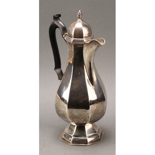 236 - An Edwardian silver octagonal baluster coffee pot, hinged cover with wrythen finial, ebonised handle... 