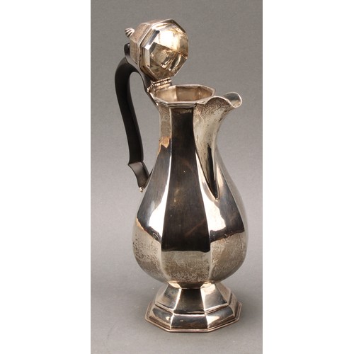 236 - An Edwardian silver octagonal baluster coffee pot, hinged cover with wrythen finial, ebonised handle... 