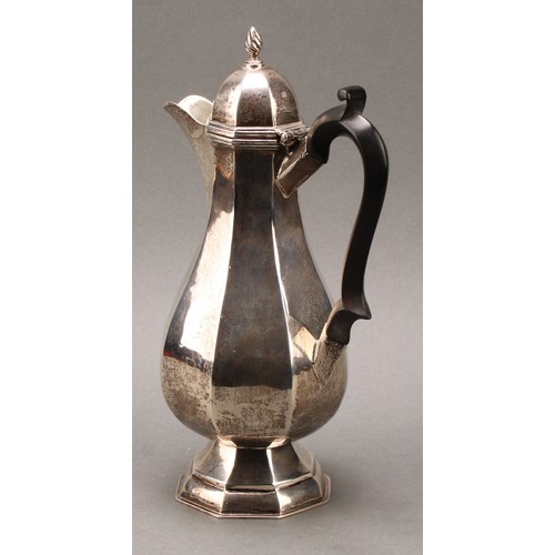 236 - An Edwardian silver octagonal baluster coffee pot, hinged cover with wrythen finial, ebonised handle... 