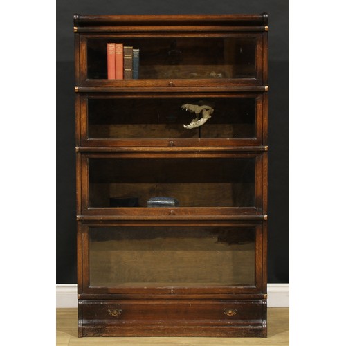 1574 - An early 20th century oak barrister's bookcase, by Globe Wernicke, comprising four modular stacking ... 