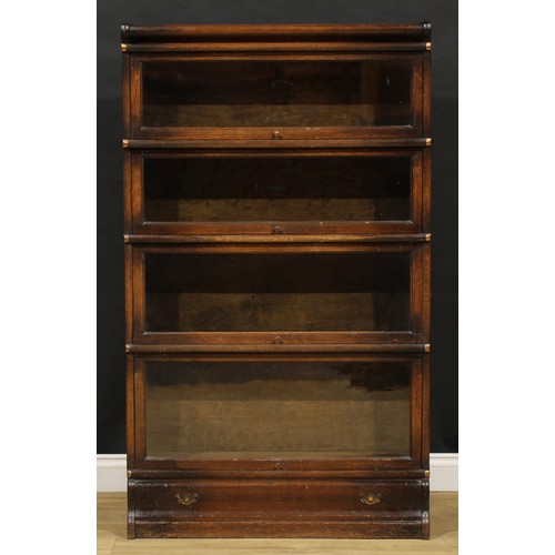 1574 - An early 20th century oak barrister's bookcase, by Globe Wernicke, comprising four modular stacking ... 