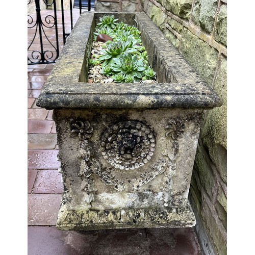 1996 - A rectangular Haddonstone type garden trough, cast with Neo-Classical roundels, swags and festoons, ... 