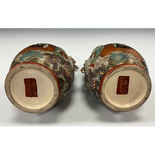 1222 - A pair of Japanese Satsuma Pottery baluster vases, each painted with Immortals and dragon, dragon mo... 