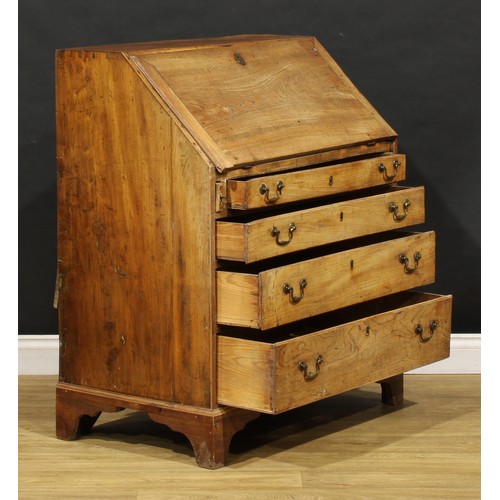 1730 - A George III elm bureau, fall front enclosing a fitted interior, above four long graduated drawers, ... 