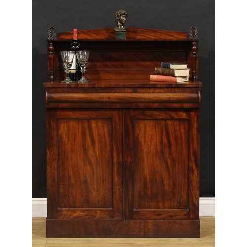 1693 - A George IV mahogany chiffonier, of small proportions, cushion moulded drawer to frieze above a pair... 