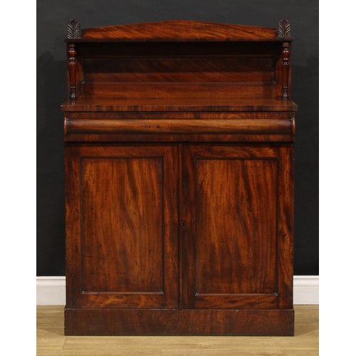 1693 - A George IV mahogany chiffonier, of small proportions, cushion moulded drawer to frieze above a pair... 