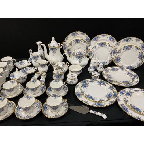 1232 - A Royal Albert Moonlight Rose pattern tea service for six comprised of; a tea pot, a coffee pot, sug... 