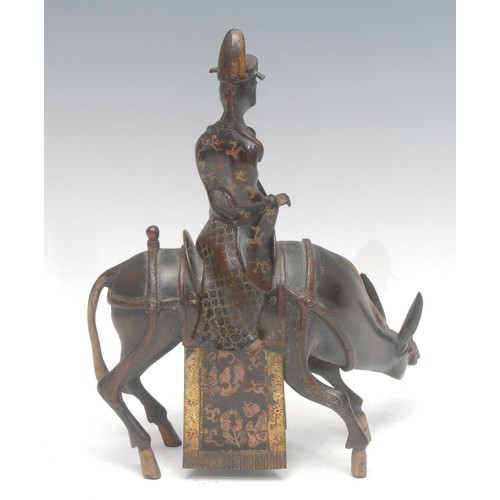 1818 - A Chinese bronze animal zun or ritual vessel, cast as a scholar seated on a horse, picked out in gil... 