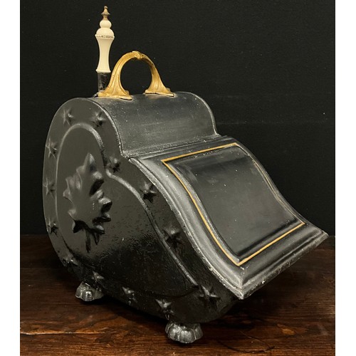 1666 - A Victorian embossed coal scuttle and shovel, leaf and star details, black and gold painted body, pa... 