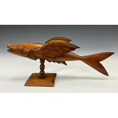 1860 - A Pitcairn Island carved flying fish, with the inscription ‘made by Thomas Christian’ to one wing, a... 