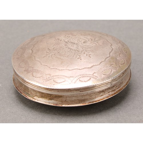 105 - A 19th century Dutch silver circular snuff or peppermint box, engraved with wrigglework, 5.5cm diam,... 