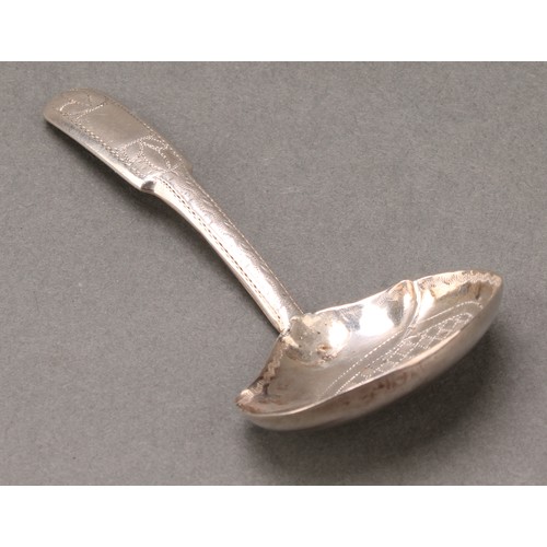 64 - A George III silver caddy spoon, the bowl engine turned with a chequered panel, outlined throughout ... 