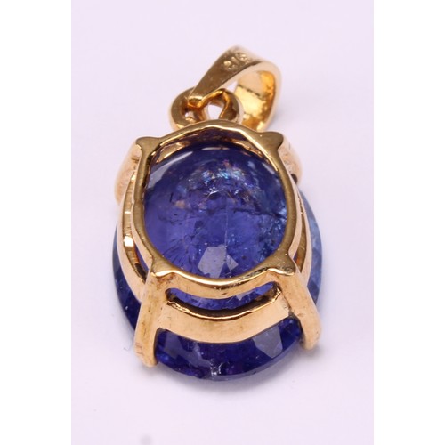 611 - A mixed oval cut tanzanite pendant, 7.82ct certified Violetish blue tanzanite, 14.84mm x 11.27mm x 6... 