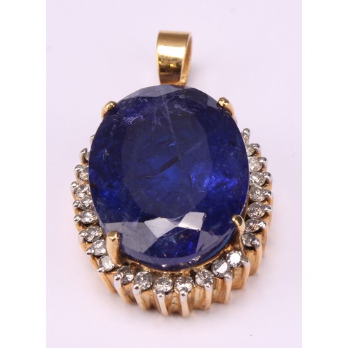 610 - A mixed oval cut tanzanite and diamond pendant, central 22.57ct certified violetish blue tanzanite, ... 