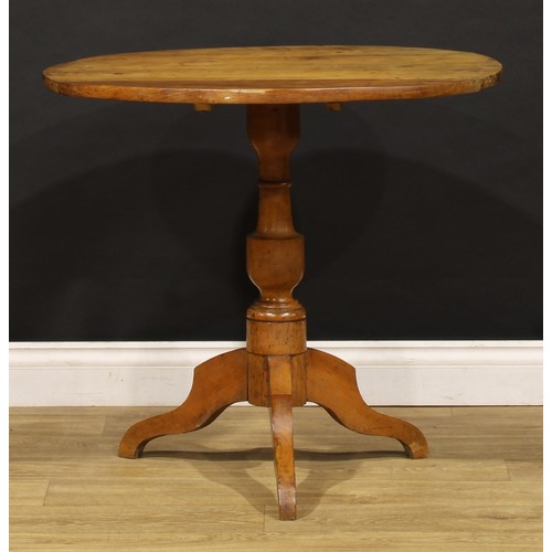 1592 - A 19th century fruitwood tripod occasional table, circular tilting top, turned pillar, shaped downsw... 