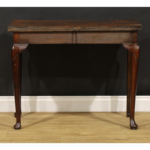 1740 - A George III mahogany serpentine card table, folding top enclosing an inset baize lined playing surf... 