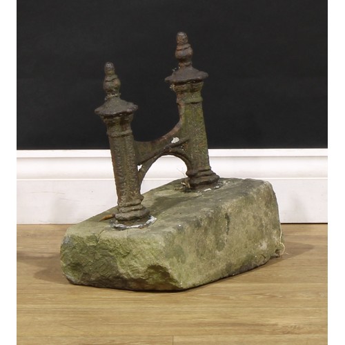 1984 - A 19th century cast iron and limestone country house boot scraper, in the Gothic Revival taste, 33cm... 