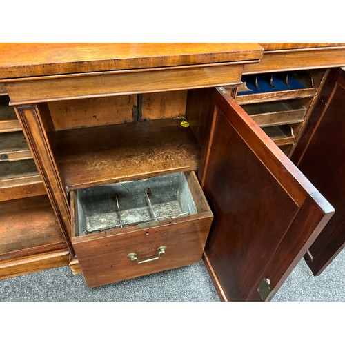 2134 - A Regency mahogany chiffonier sideboard, three-quarter galleried top, break-centre front with centre... 