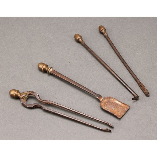 1499 - A set of 19th century steel and brass doll's house fire irons, the tongs 12cm long