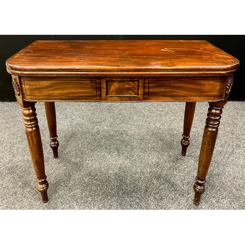 2136 - A Regency mahogany fold-over tea-table, in the manner of Gillows of Lancaster, ebony stringing to th... 