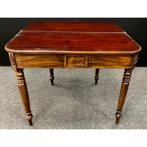 2136 - A Regency mahogany fold-over tea-table, in the manner of Gillows of Lancaster, ebony stringing to th... 