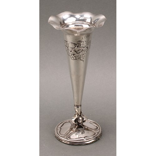 149 - A pair of Art Nouveau silver flower vases, each embossed with stylised flowers, wavy everted rims, s... 