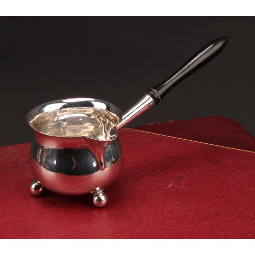 172 - A Victorian silver brandy saucepan, turned ebonised handle terminating in a heart shaped socket, 14.... 