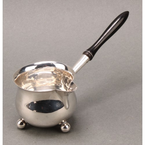 172 - A Victorian silver brandy saucepan, turned ebonised handle terminating in a heart shaped socket, 14.... 