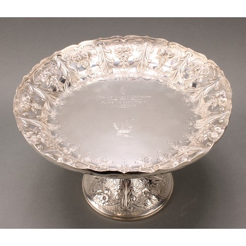 279 - A Victorian silver pedestal table centre comport, in the Gothic Revival taste, shaped circular bowl,... 