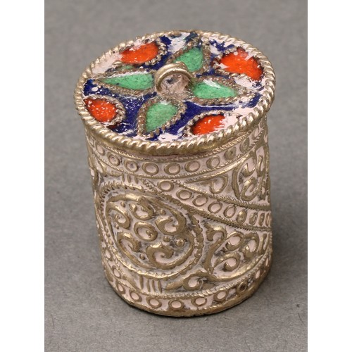 146 - A Middle Eastern silver coloured metal cylindrical box, the push-fitting cover decorated in polychro... 