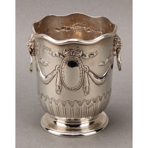 284 - A Victorian silver sweetmeat vase, chased in the Neo-Classical taste, lion mask handles, skirted bas... 