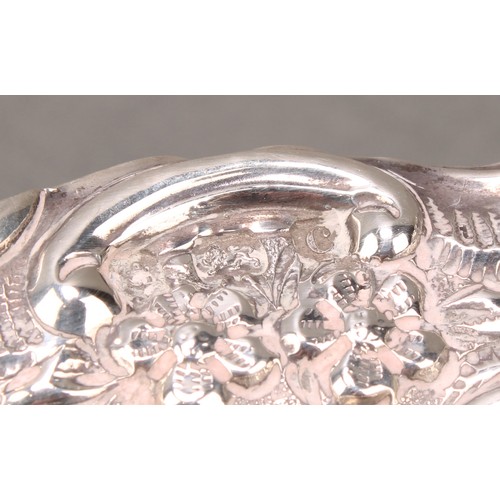 238 - An Edwardian silver rectangular pedestal fruit or sweetmeat dish, pierced and embossed with flowers ... 