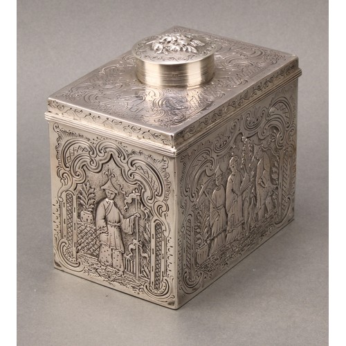 134 - A George III silver rectangular tea caddy, chased overall in the chinoiserie taste with Chinese figu... 