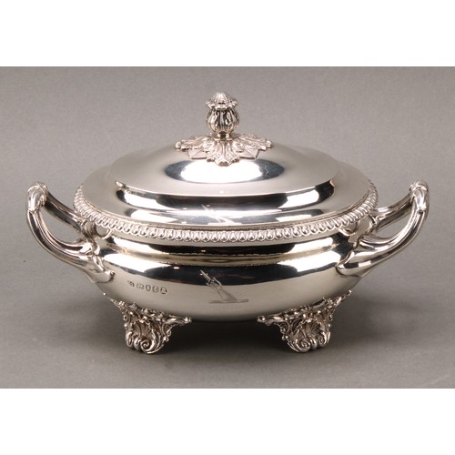 298 - Paul Storr - a pair of George IV silver oval sauce tureens and covers, acanthus bud finials, gadroon... 