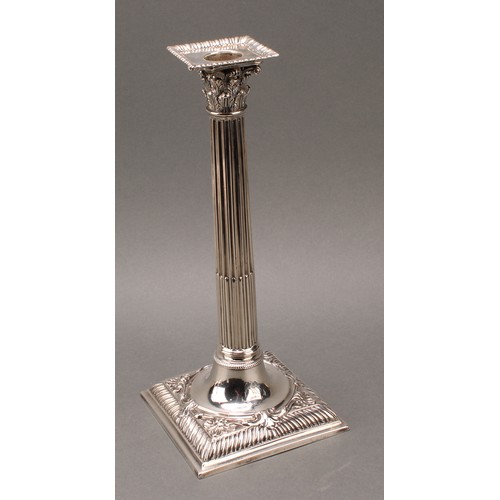 208 - A set of four early George III cast silver Corinthian column table candlesticks, detachable nozzles,... 