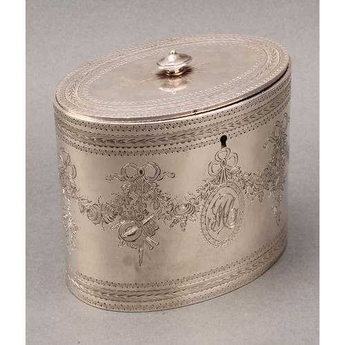 408 - A set of three George III silver oval tea caddies, bright-cut engraved in the Neo-Classical taste wi... 