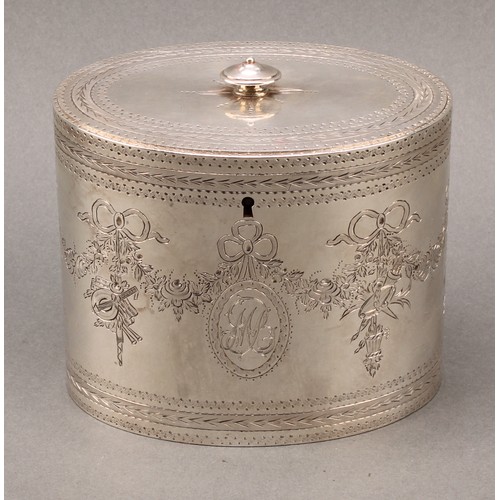 408 - A set of three George III silver oval tea caddies, bright-cut engraved in the Neo-Classical taste wi... 